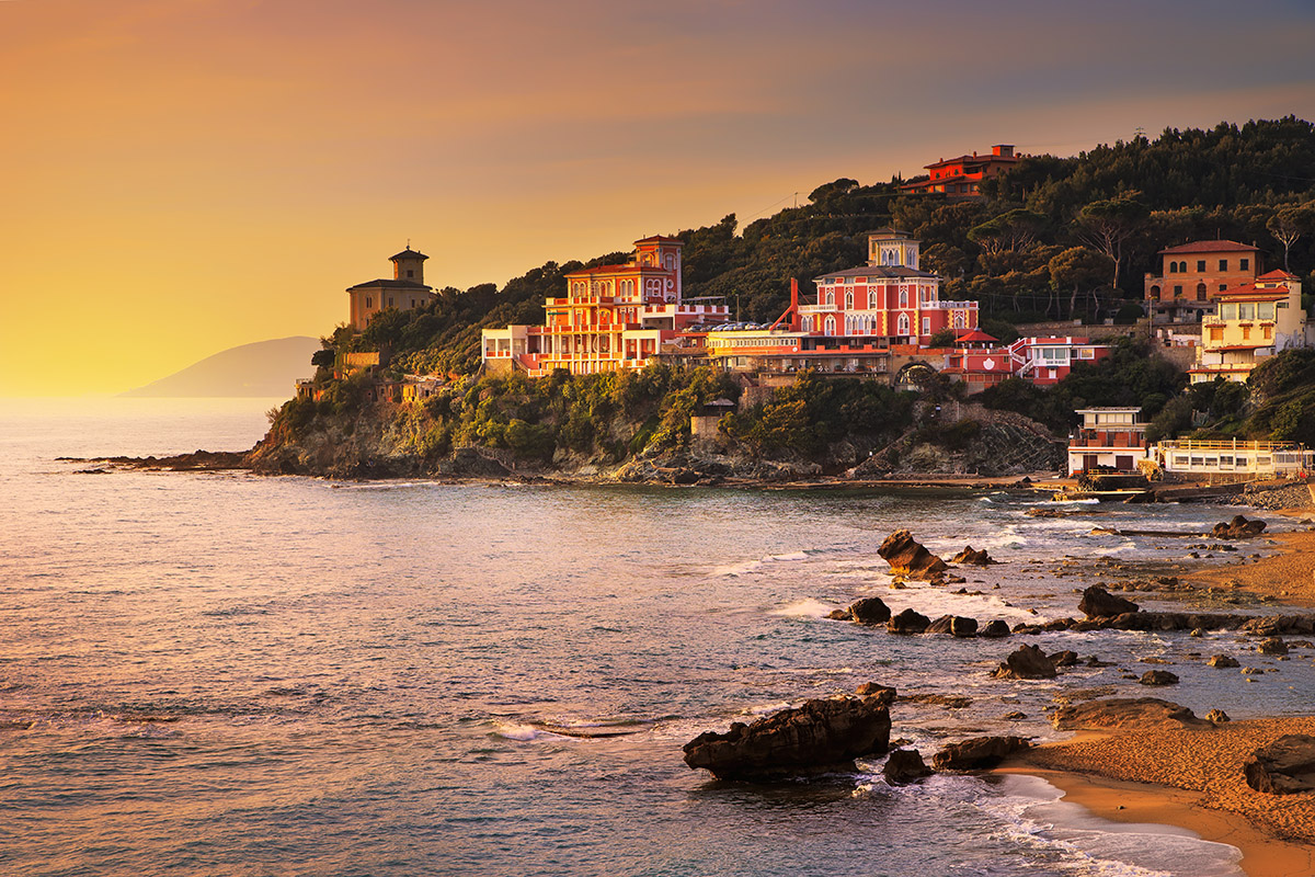 Castiglioncello sunset on cliff rock and sea. Tuscany, Italy, Europe